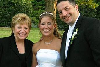 Couple with the officiant