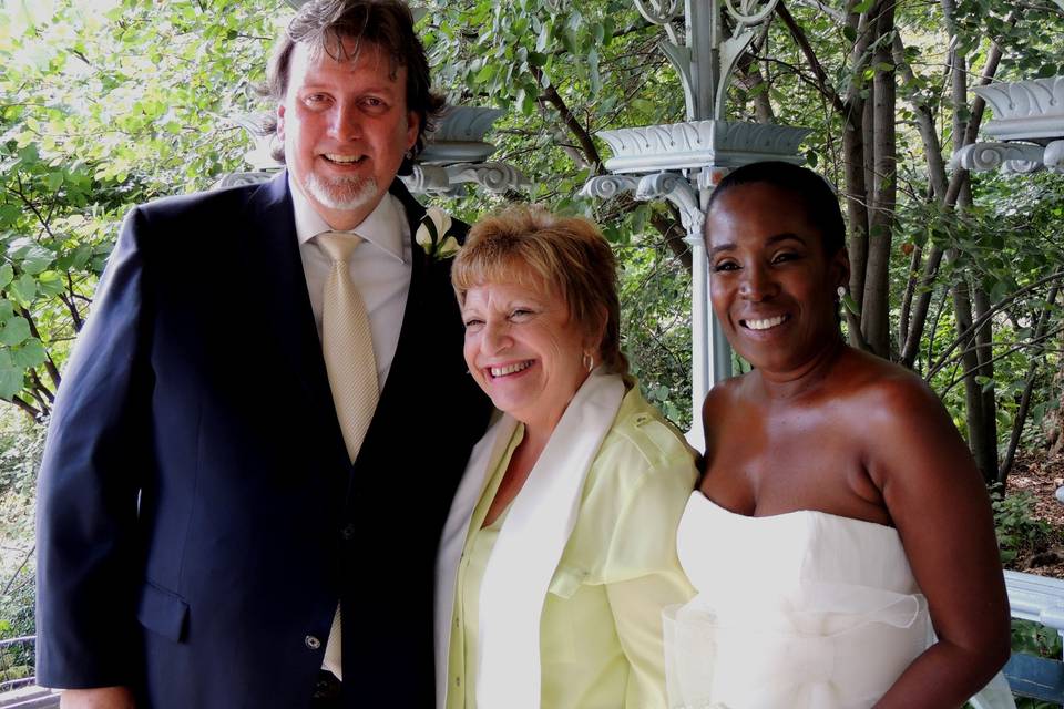 Couple with the officiant