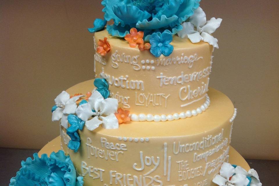 3-tier cake with blue flowers
