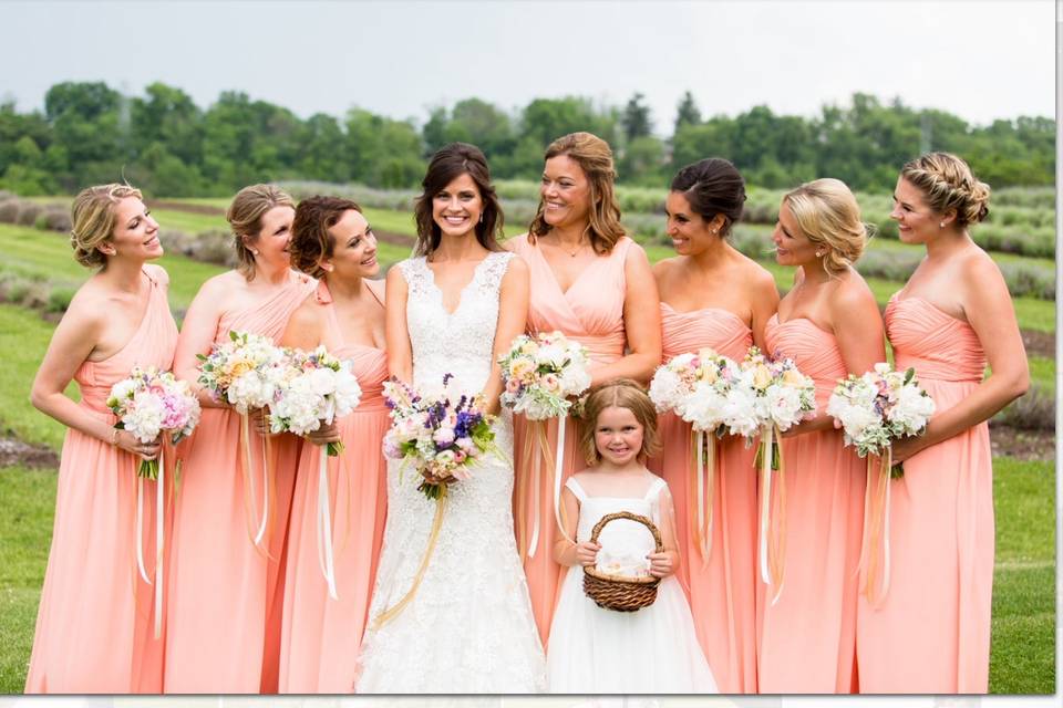 Bride with her bridesmaids and flower girl