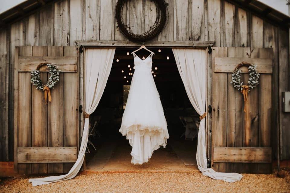 Wedding dress in barn doors