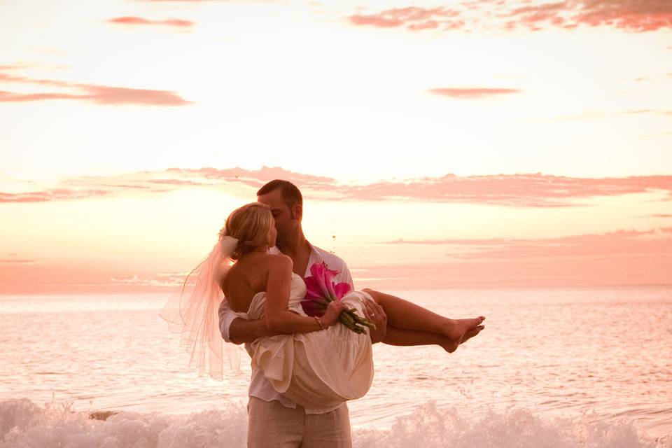 A tender moment between Kari Ann and Dillon after their ceremony in Costa Rica