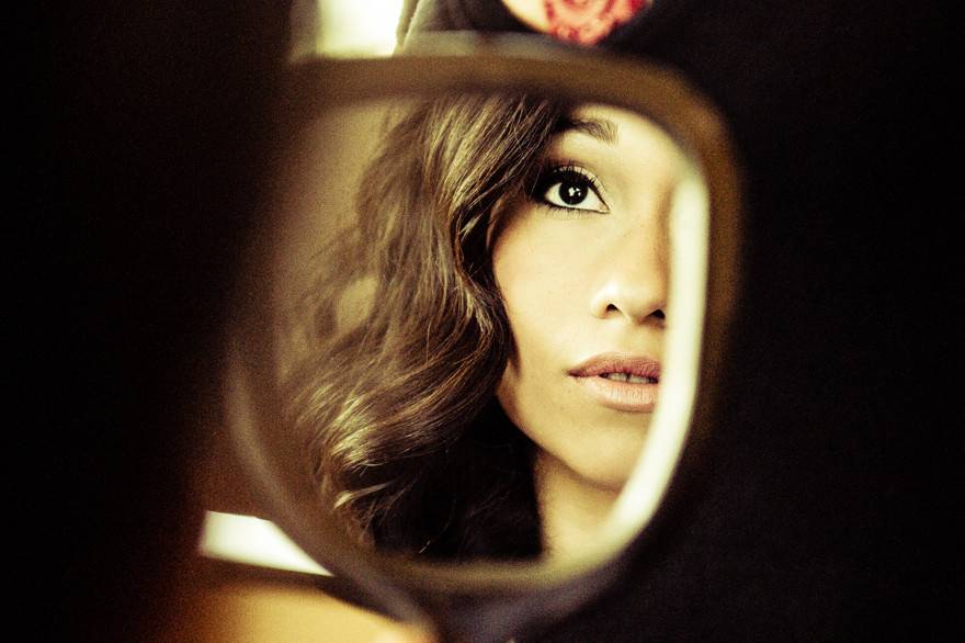 A pensive look as the bride is getting ready