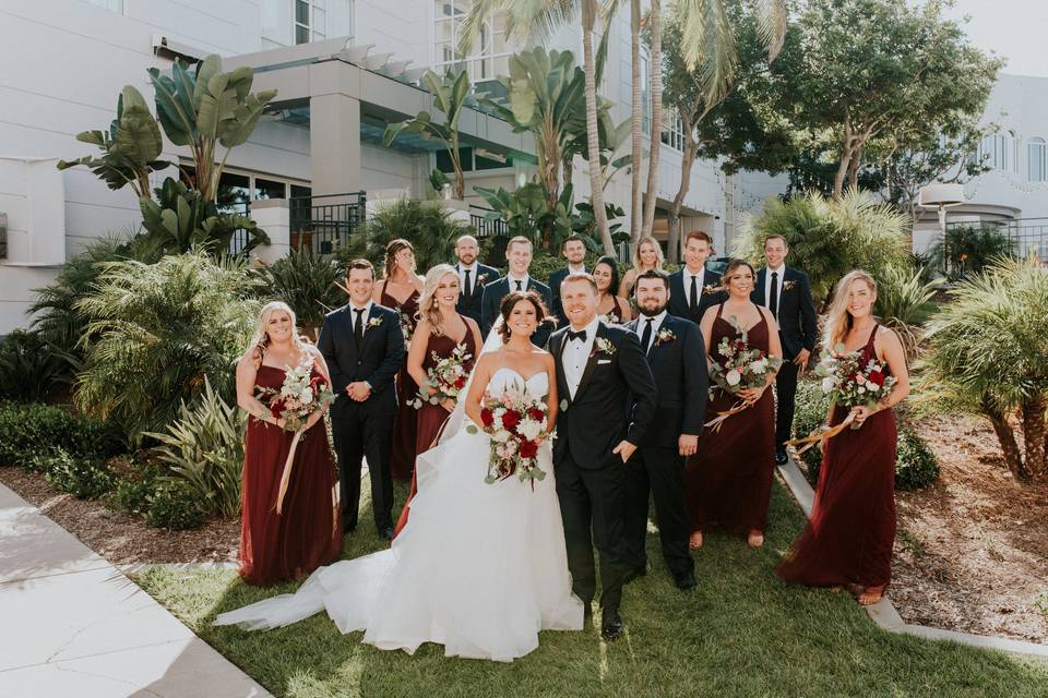 Navy tuxedo and navy groomsmen suit