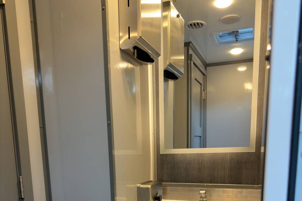 Modern Sink and backlit mirror