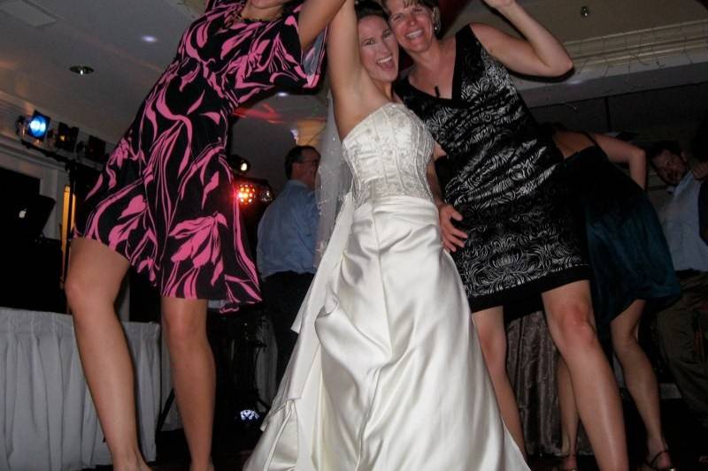 Bride with guest dancing