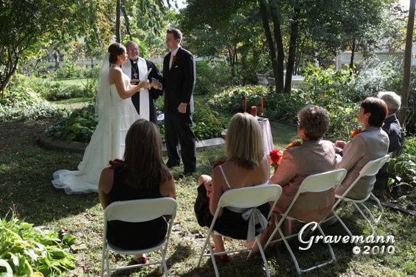 Ware - Lindsay outdoor garden wedding in front of the fountain. Photo courtesy Gravemann Photography East Alton, IL 62024.