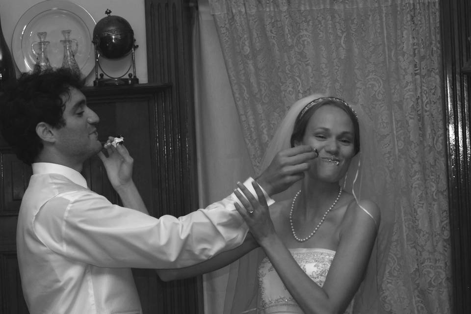 First bite of wedding cake as husband and wife.