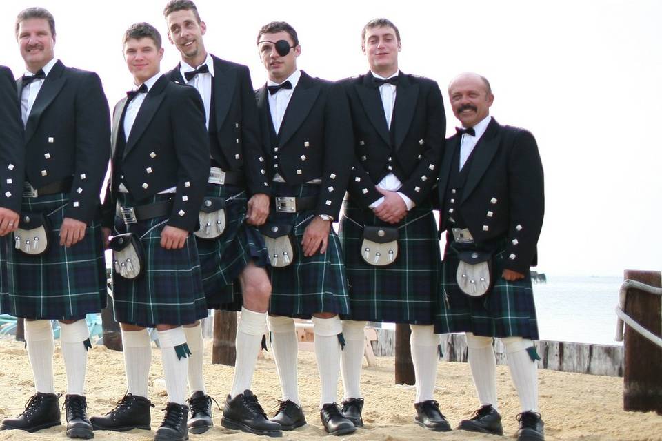 Men in Black Watch Dress tartan kilts provided by Irish Traditions.