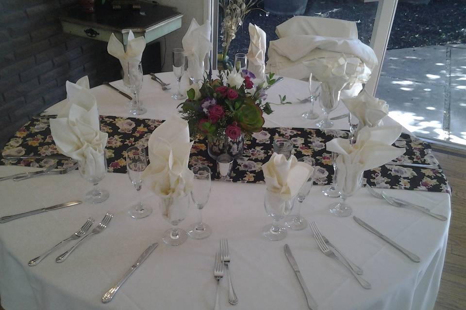 Round table with floral centerpieces