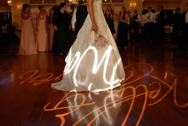Our bride in the indoor ballroom at The Grandview in Poughkeepsie, NY about to toss her bouquet.  Customized 