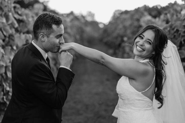 Bride and groom in vineyard