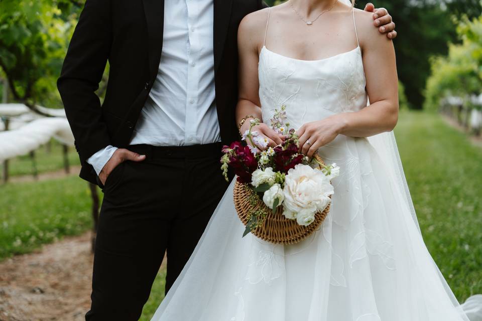 Bride and groom in vineyard