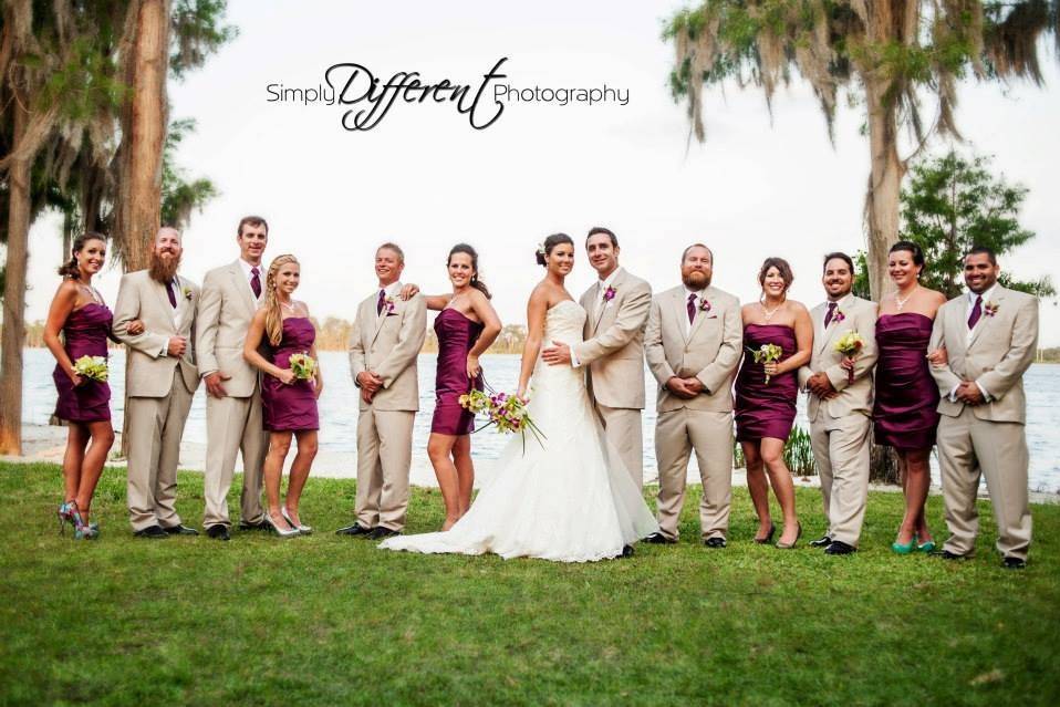 The couple with the bridesmaids and groomsmen