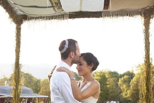 Couple forehead kiss