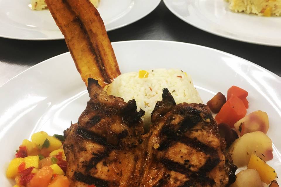 Caribbean chicken over island rice with mango plantain salsa