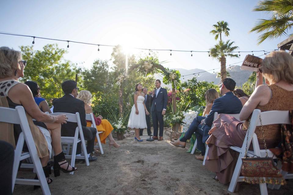 This wedding arbor seems to glow!