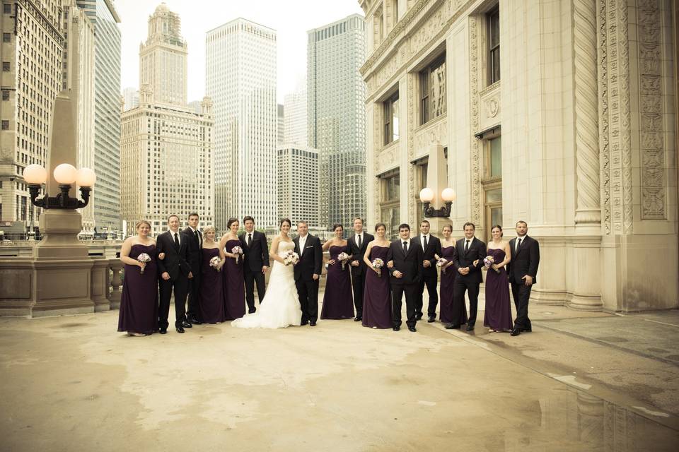 The couple with the bridesmaids and groomsmen