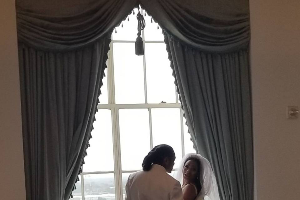 Couple gazing out the window