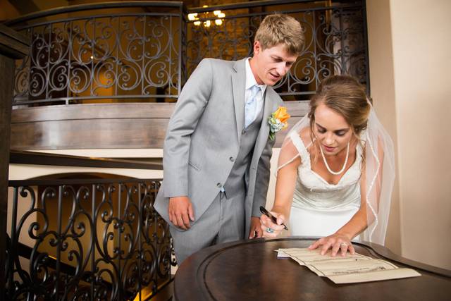 Newlyweds signing