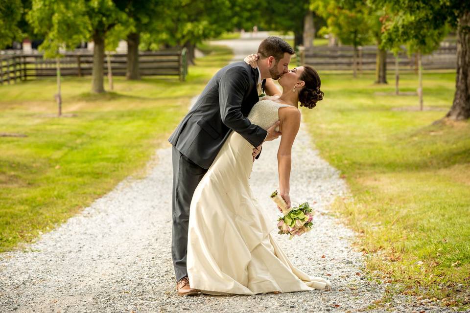 Groom kissing his bride