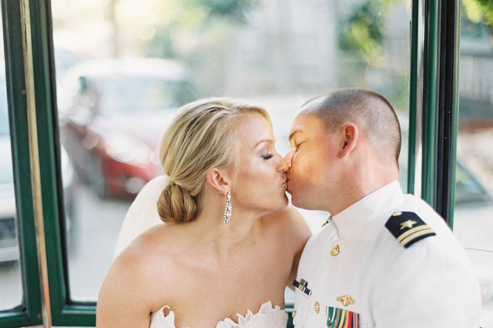 Bride and groom share a kiss