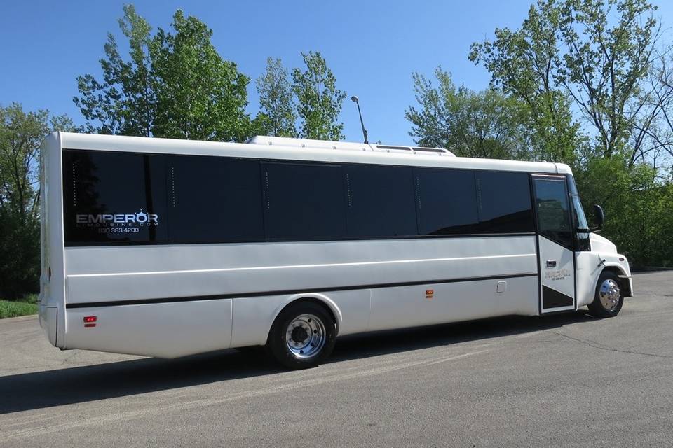 This is what our party buses look on the outside. Great lines, clean, chrome wheel simulators, pearl white paint job, tinted single look windows and much more!