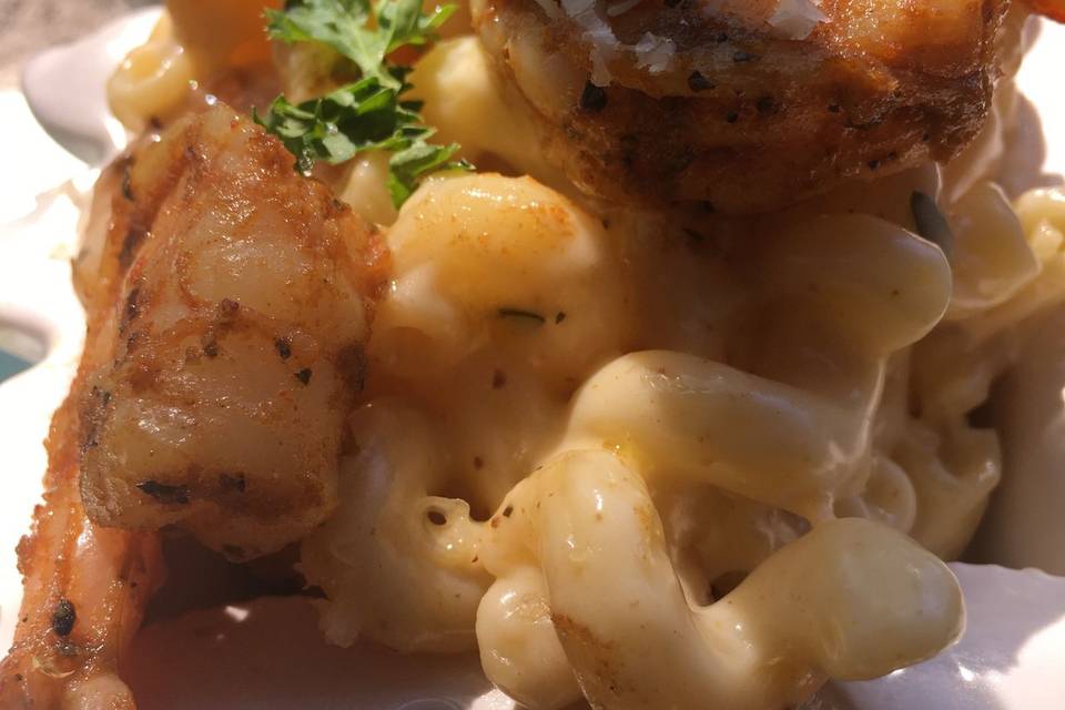White Cheddar Mac topped with Cajun shrimp
