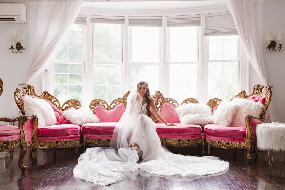 Bride on pink couch