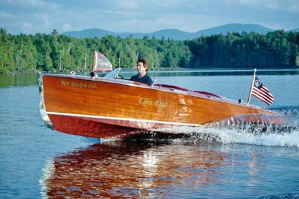 Our 1936 Chris Craft makes a perfect escape for the bride and groom.