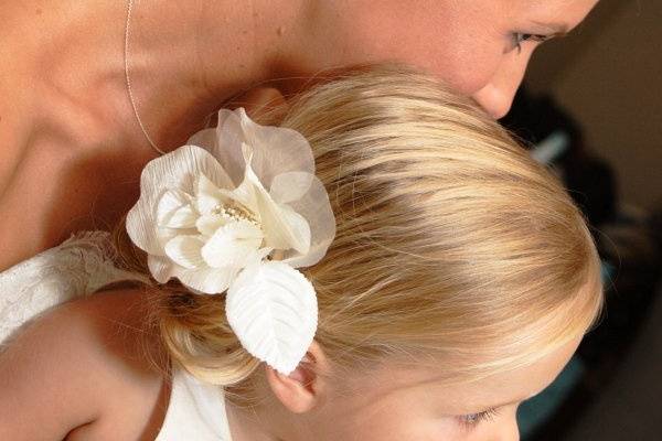 Bride and flower girl with hair ornaments
