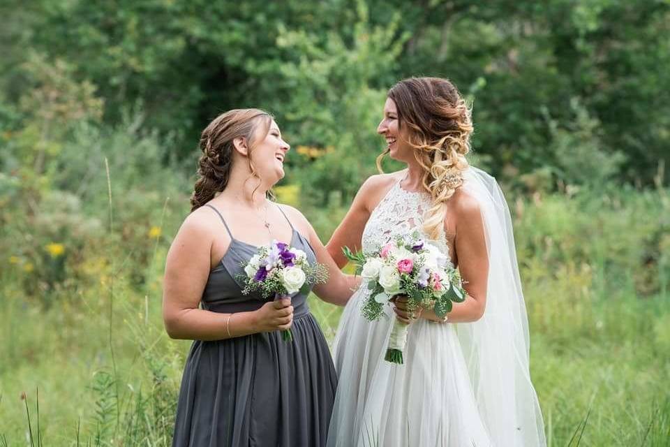 Happy bride and bridesmaid