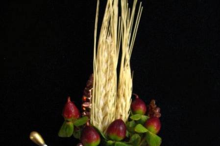 Wheat and red Hypericum boutonniere