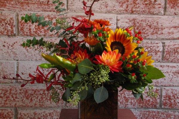 Autumn centerpiece, dahlia, sunflowers,mums and orchids