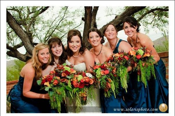 Wedding at the Tanque Verde Guest Ranch here in Lovely Tucson, Az! Bouquet done in vivid limes and oranges with succulents added for texture and dramatic effect.
