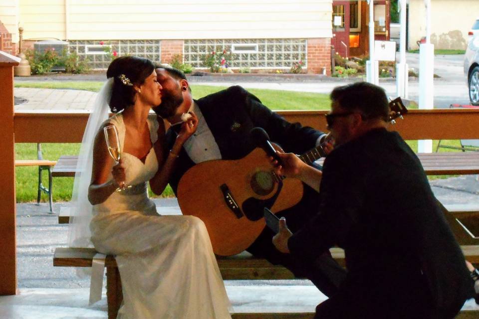Hubby singing to his new bride