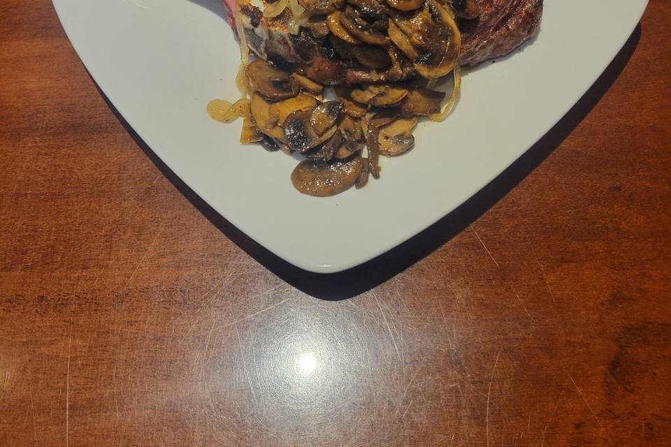 Bone in Ribeye with mushrooms
