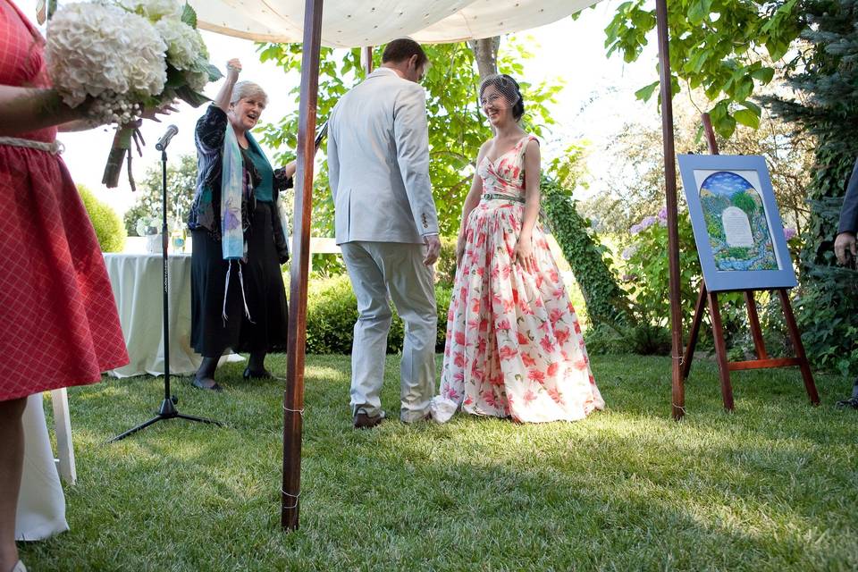 Radha and Lance's wedding at a winery in Sebastopol, July 2011, as Lance's breaks the glass.