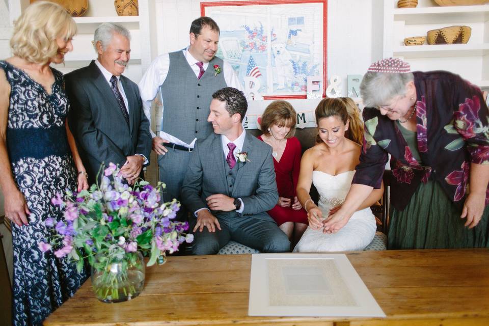 Ryan and Erin signing the ketubah, September 2014 at a private home on Lake Tahoe