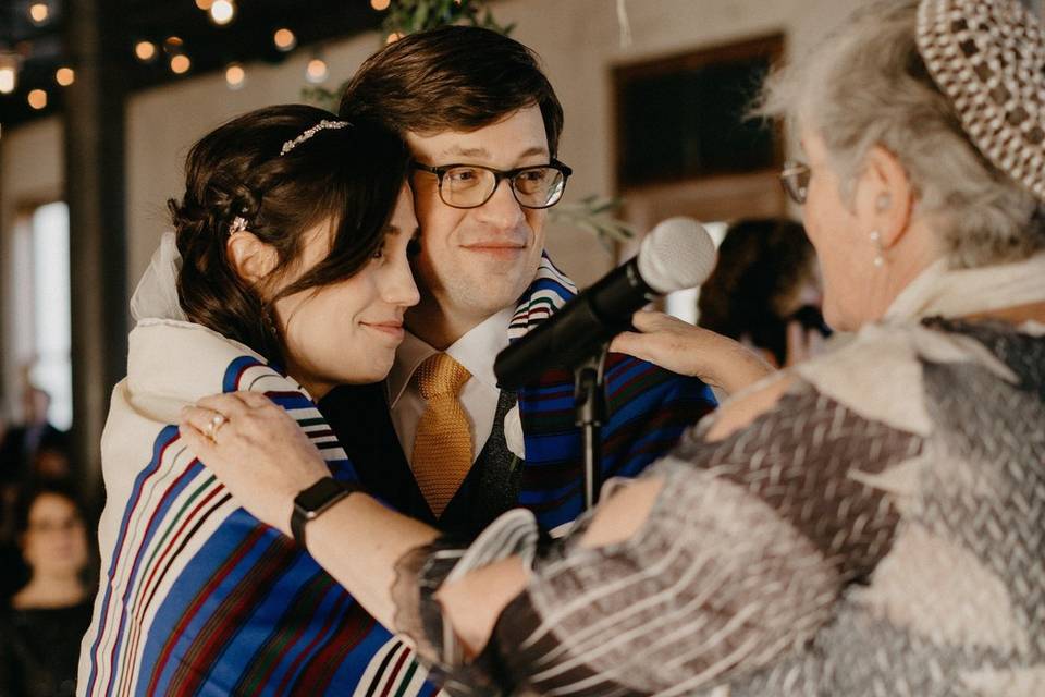 Brian and Eliza under the blessing tallit at the Headlands Institute October 2017