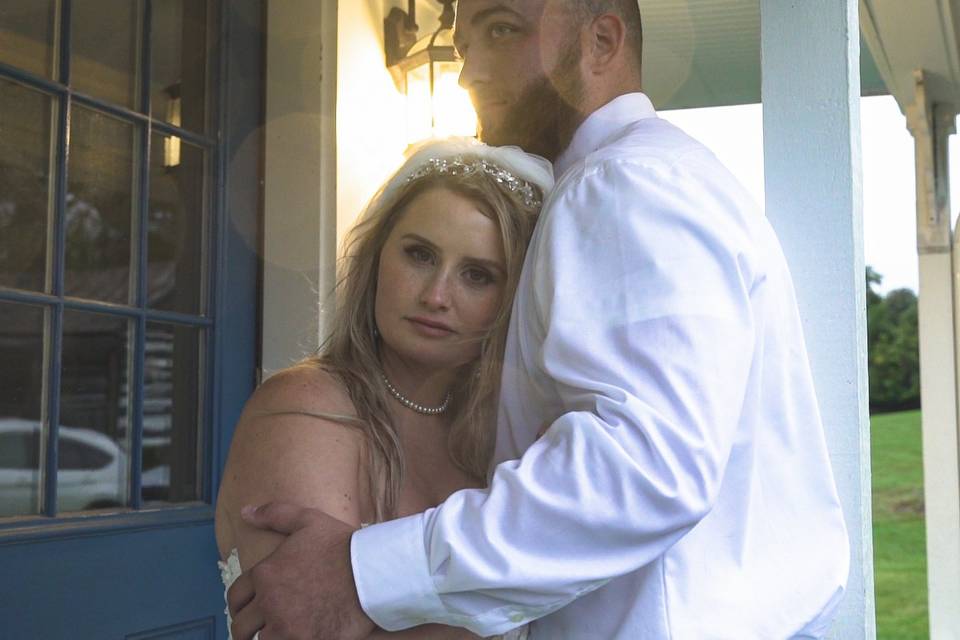 Bride and groom holding