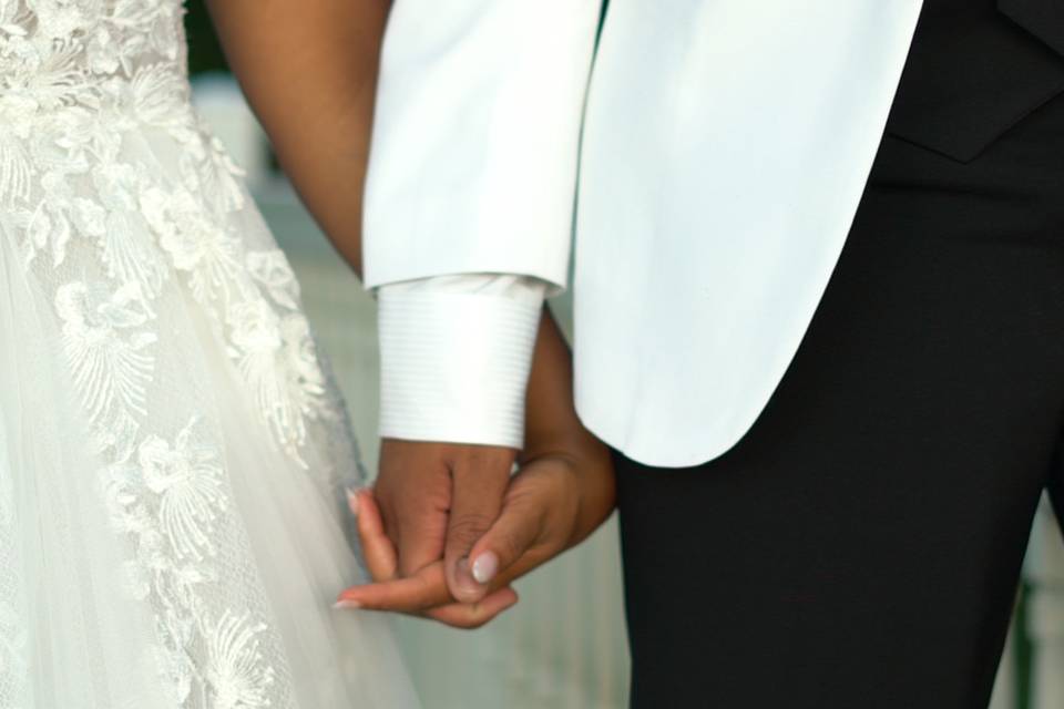 Newlyweds holding hands