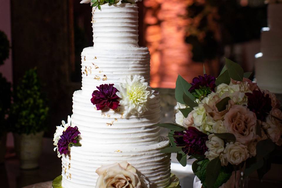 Wedding cake with red and white flowers