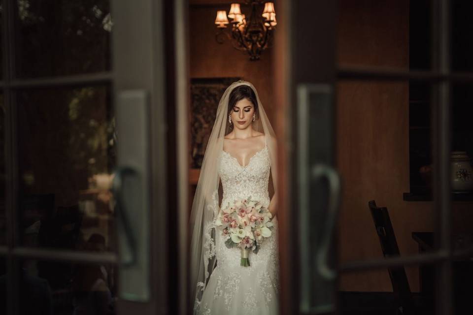 The bride entering | Hair and Makeup by Moonstone Artistry, Photo by Gloria Francis Photography at Bella Collina