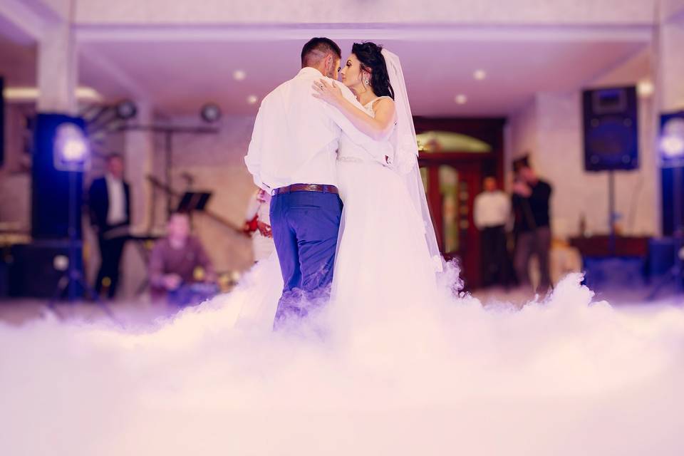 Couple dancing on a cloud