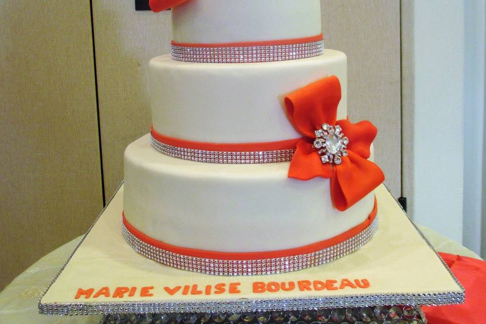 Wedding cake with orange bows