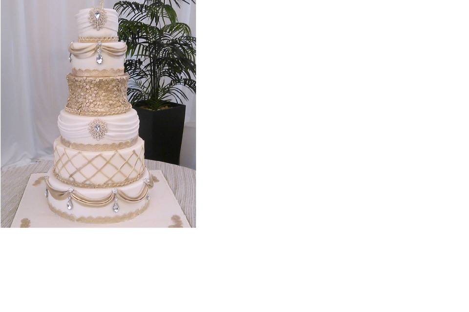White wedding cake with gold details