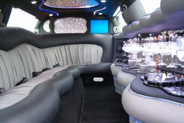 Our Chrysler 300 Limo is the hottest one in Chicago land. Check out the bar and cieling lights and shape.