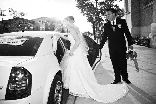 Bride & Groom entering our Chrysler 300 Limo after the ceremony