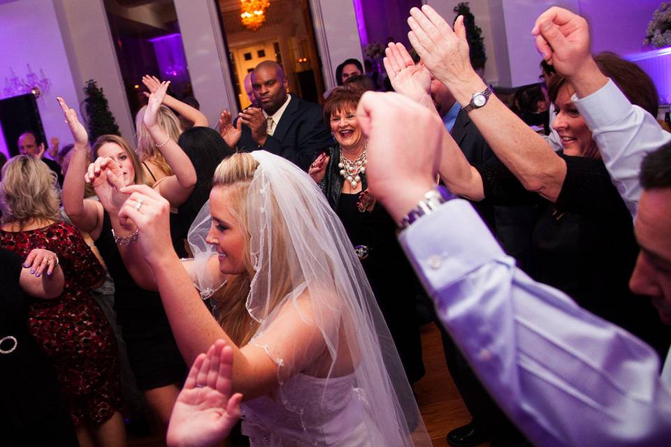 Bride dancing with the guests